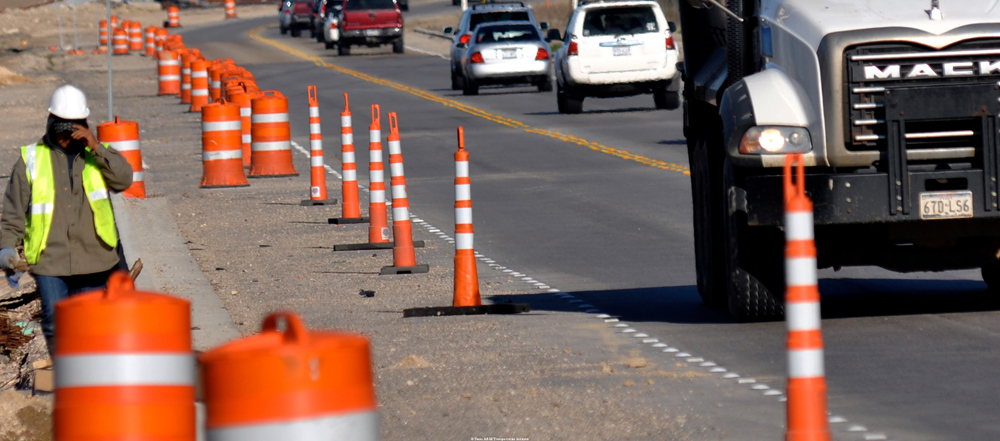 Work Zone Images with Cars Passing By